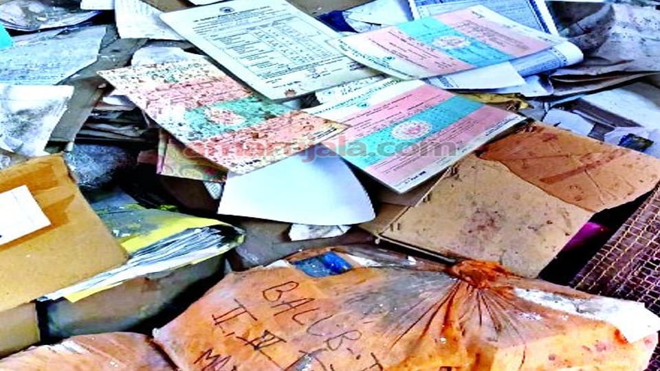 Marksheets and degrees lying in the garbage of the examination department of Dr. Bhimrao Ambedkar University A