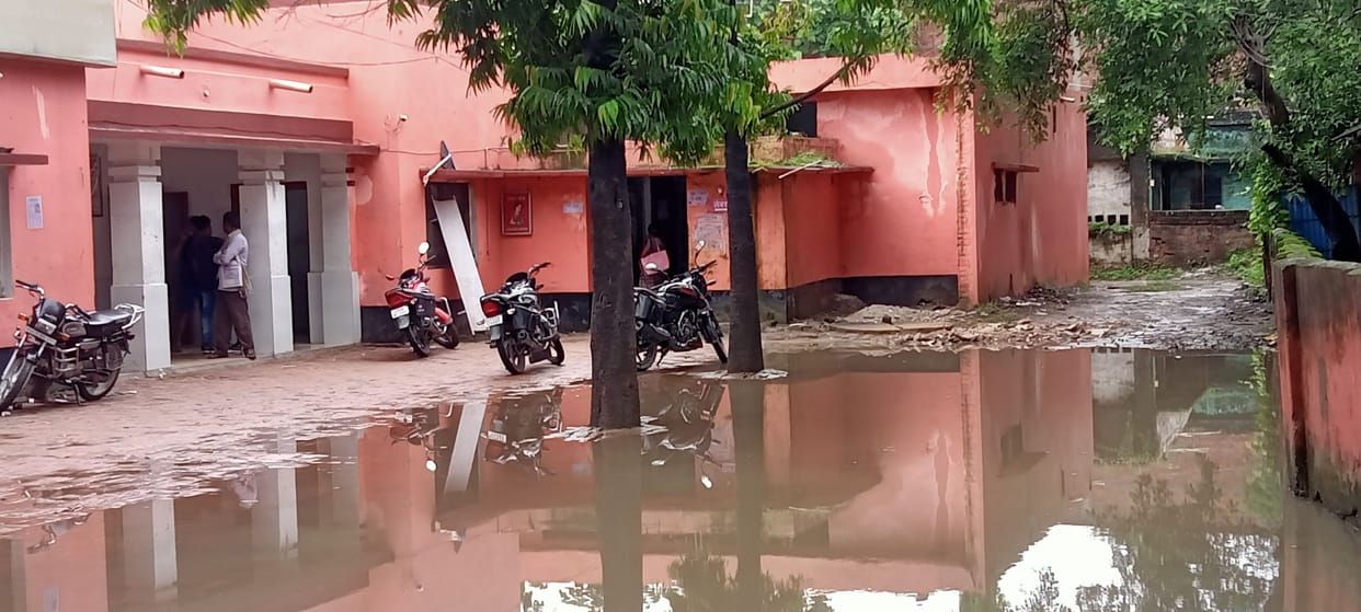 Water filled in the potholes of the road, traffic became difficult