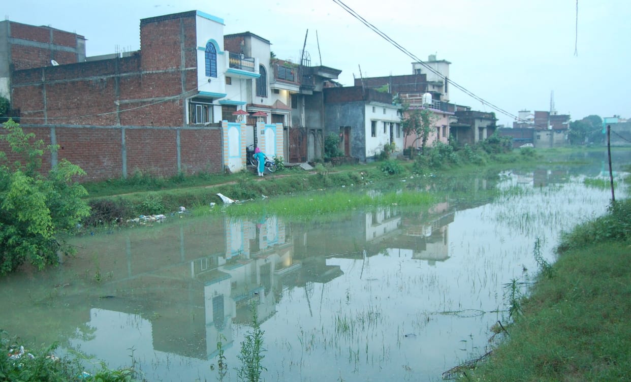 People in breath due to waterlogging in the city