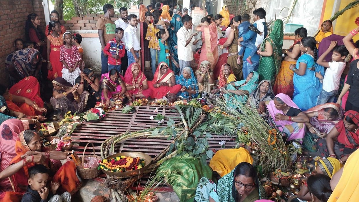 By keeping Nirjala fast, wishing for the long life of the child