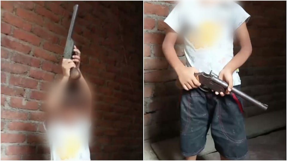 six year old child showing gun photo goes viral in mainpuri