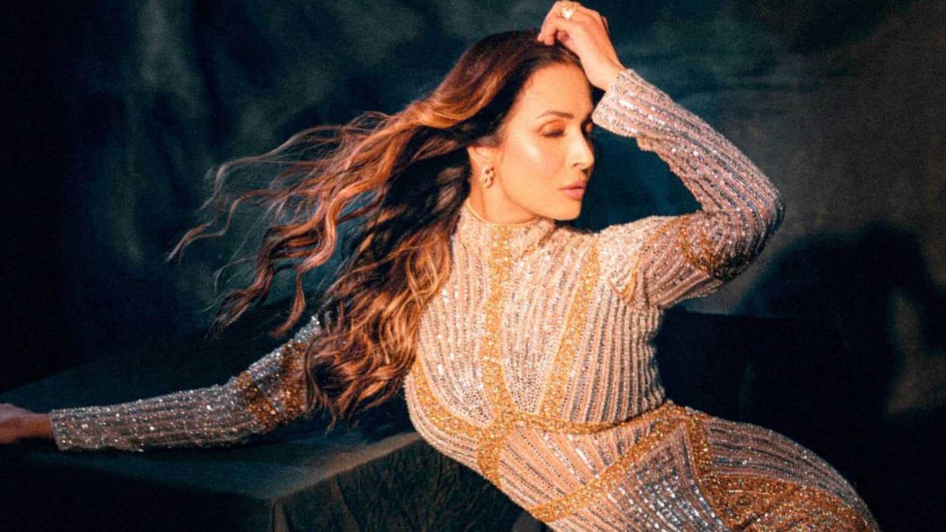 Malaika Arora Shows her bold look in new Photos in tight Fighting shimmery Gown Fans Says Beautiful