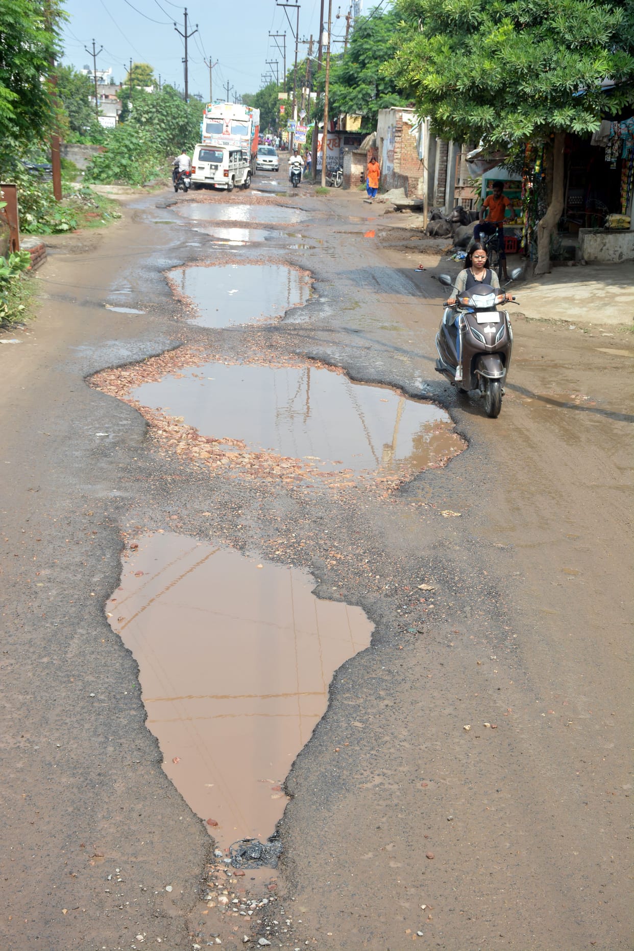 Roads from highway to countryside, pits not filled