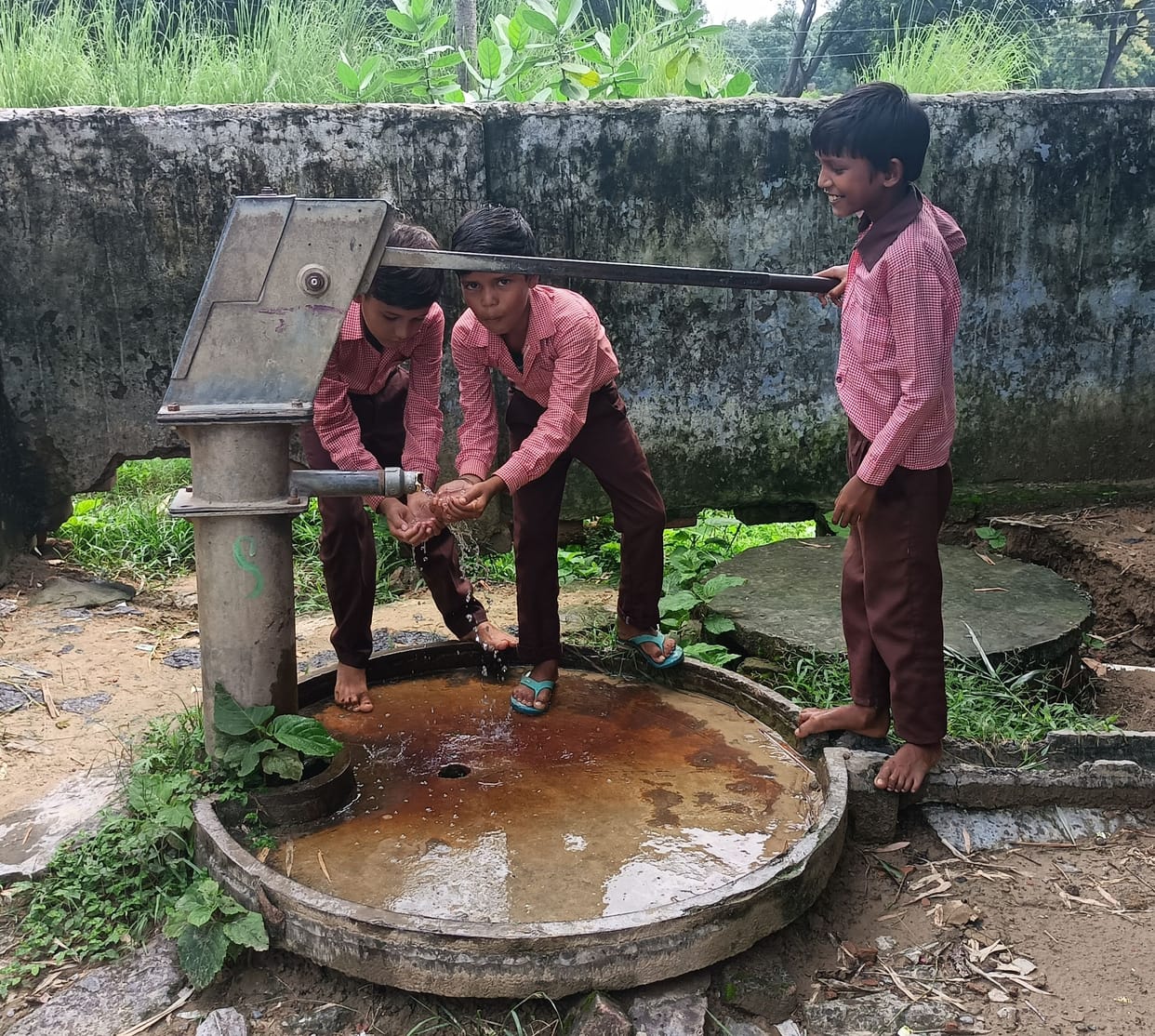 students drinking unhealthy water