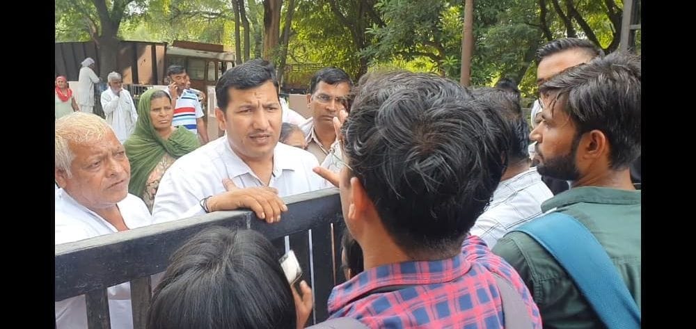 People locked the bus stand in protest against the removal of buses from the route