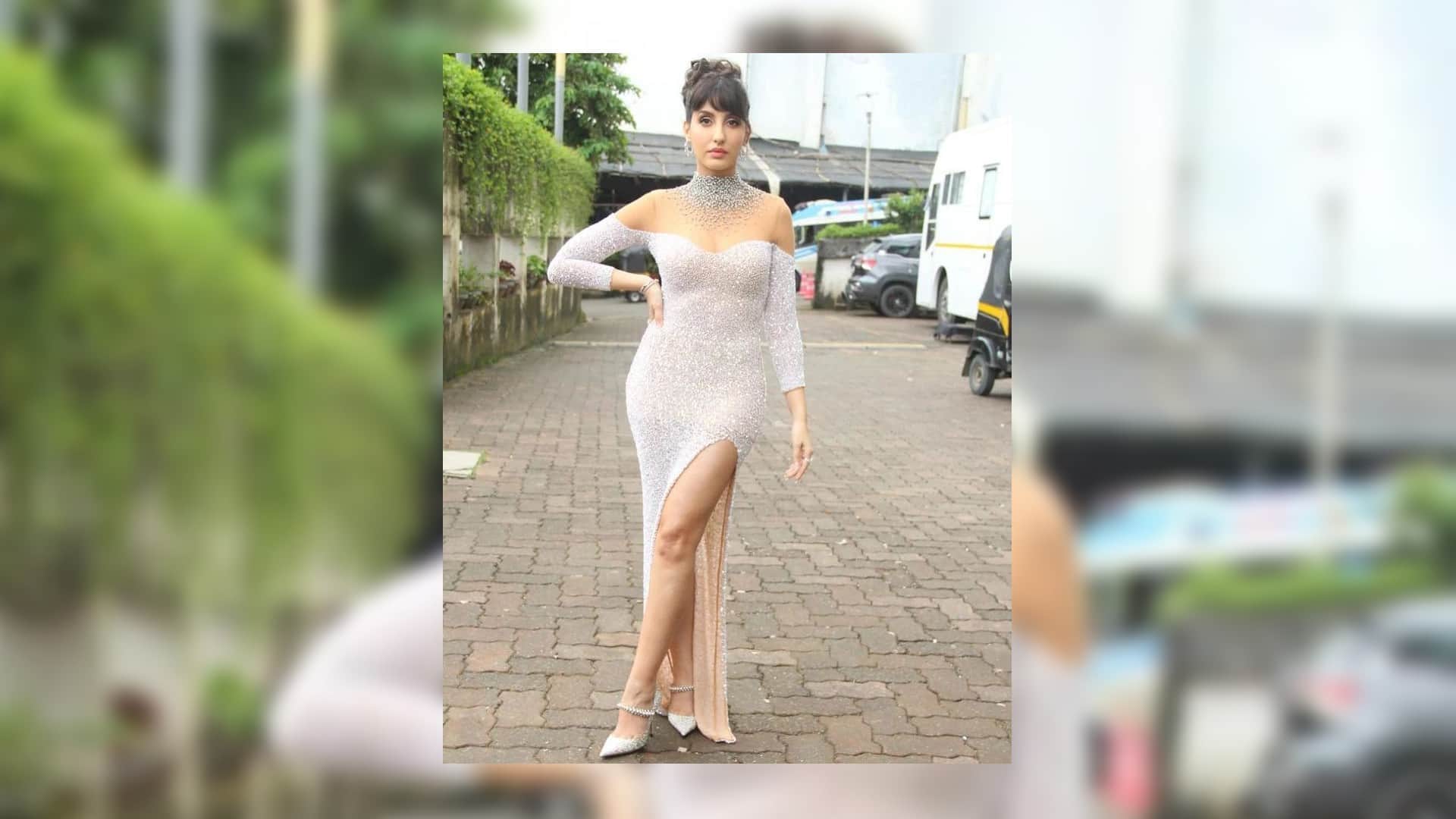 nora fatehi latest look from jhalak dikhla jaa set wear silver pink shimmer gown teases fans with tight fittin