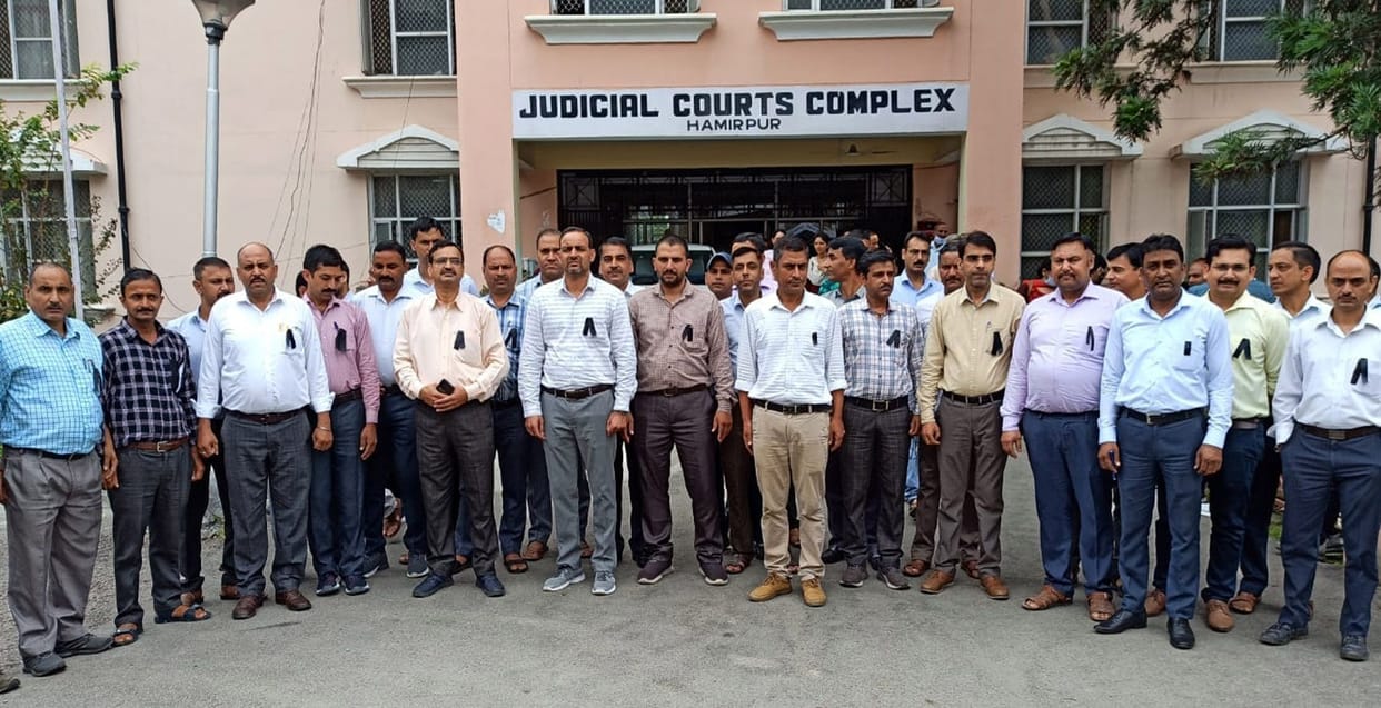 Judicial employees expressed their anger by wearing black badges