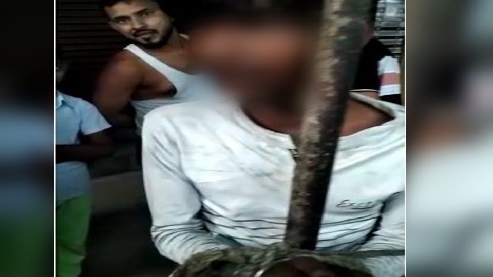 Young man tied to a tinshed pole and beaten on suspicion of theft in Agra
