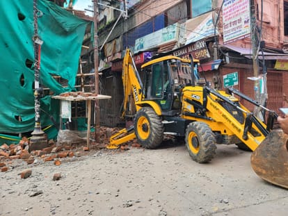 Administration in action after girls death Bulldozer and hammer on four storey illegal construction in Varanas