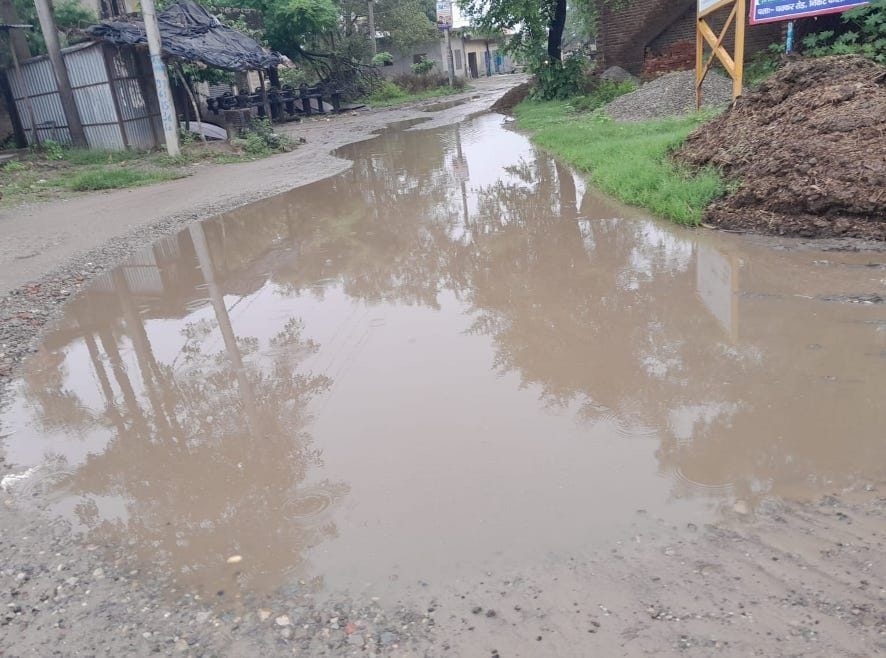 Waterlogging on the road due to lack of drainage