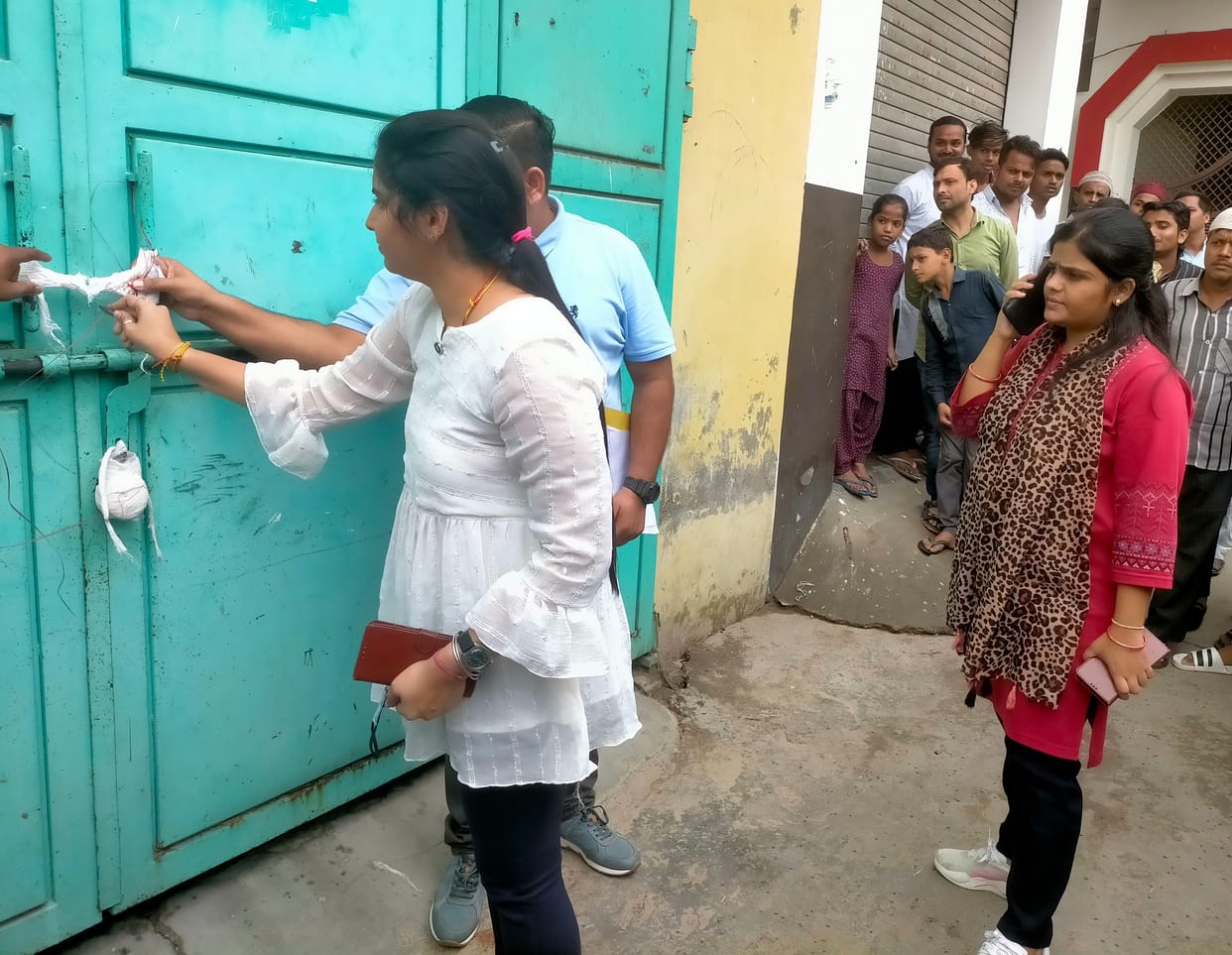 Fake medicine removed by breaking the wall from sealed medical store
