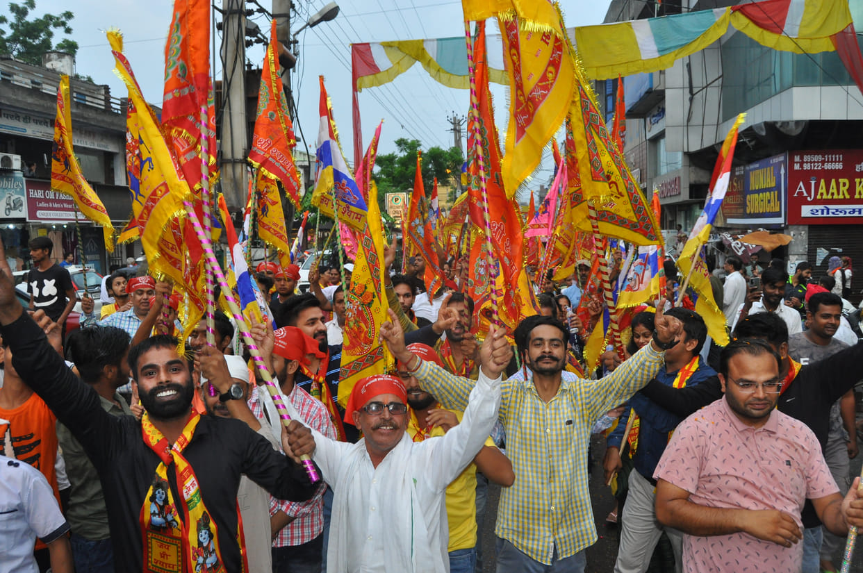 Devotees dance on the hymn 'Jagrate Waliye Teri Jai Jaikar' in the procession
