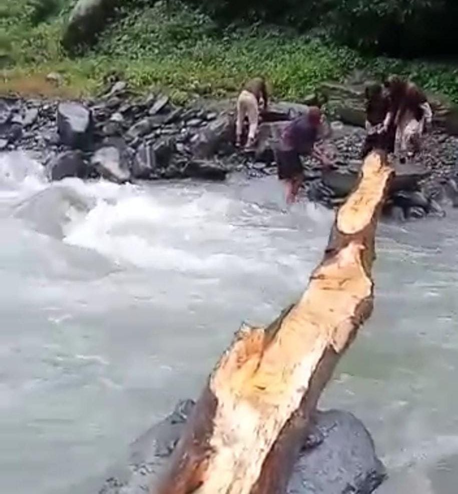 People crossing the jury drain risking their lives