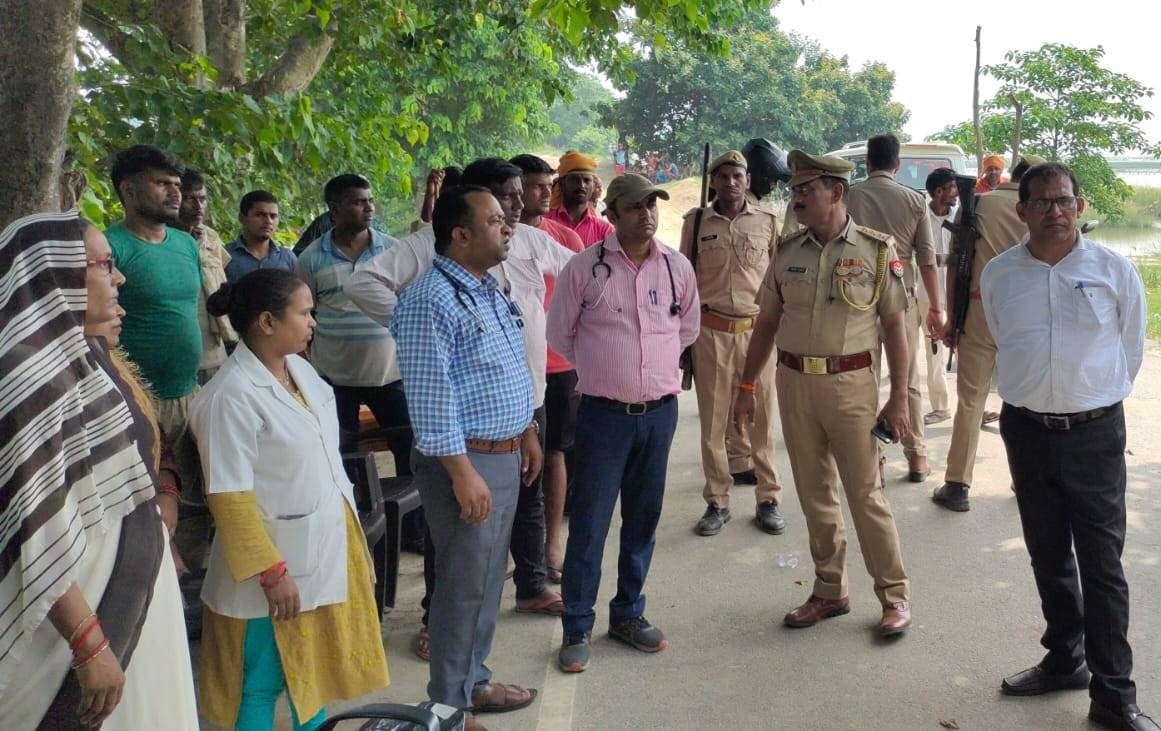 cm inspected flood area