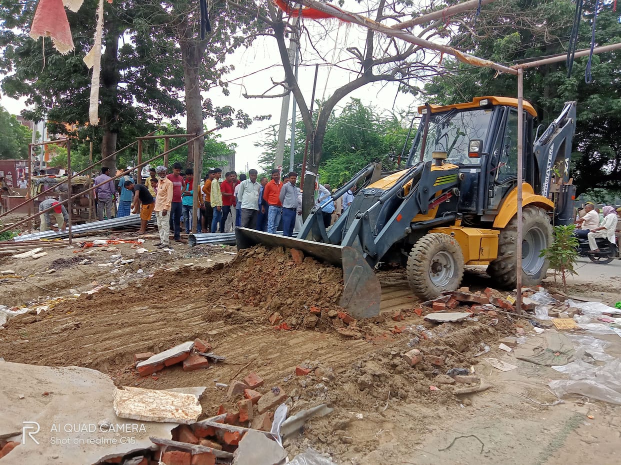 Administration's bulldozer on encroachment.