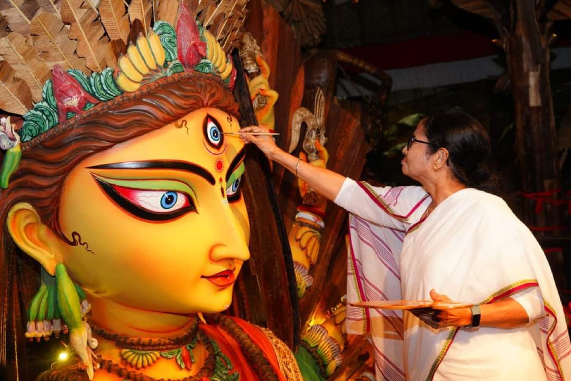 West Bengal CM Mamata Banerjee taking part in the Chokkhu Daan ritual in Kolkata