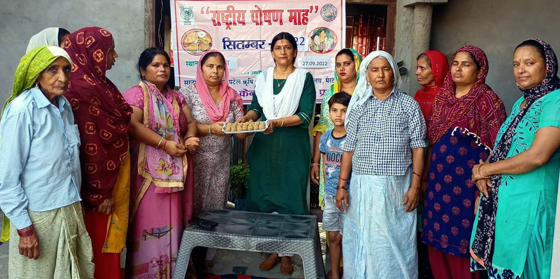 In the nutrition seminar, women learned to make millet laddus