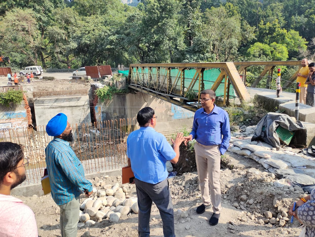 Divisional commissioner expressed displeasure over the slow pace of bridge construction
