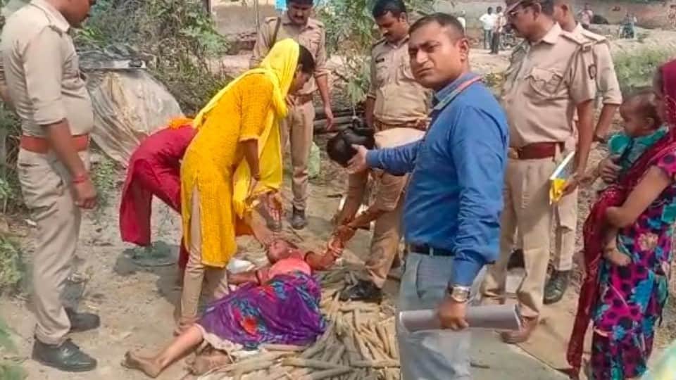 Women lying in front of bulldozer in agra revenue team went to remove possession from government land