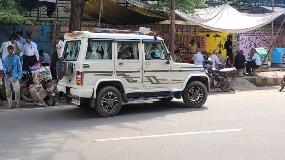 assistant municipal commissioners dog riding in government vehicle in mathura