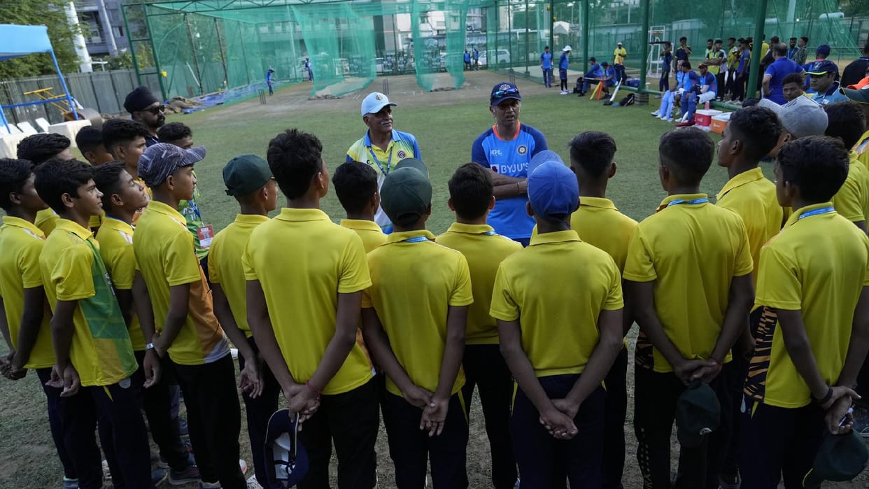 Indian Coach Rahul Dravid gives tips to young children in guwahati during team india Practice session