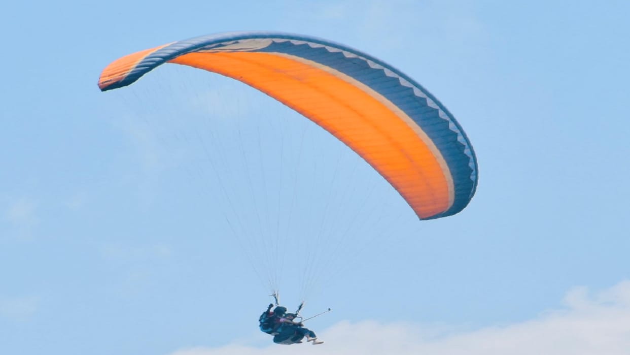 Tourists enjoying para gliding-rafting near Palpa