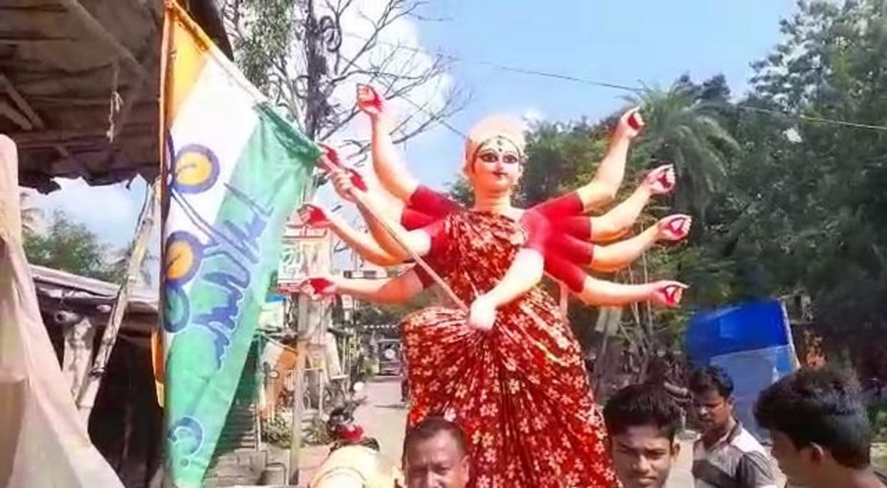west bengal: TMC flag shown in place of trishul in hands of goddess durga bjp took a jibe