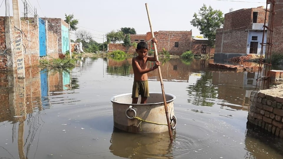 unique boat run on street in vrindavan due to yamuna flood water filled in the colonies