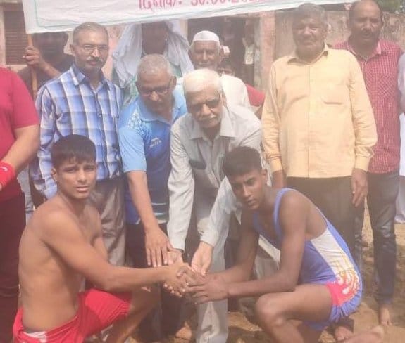 Winner player honored in regional wrestling competition