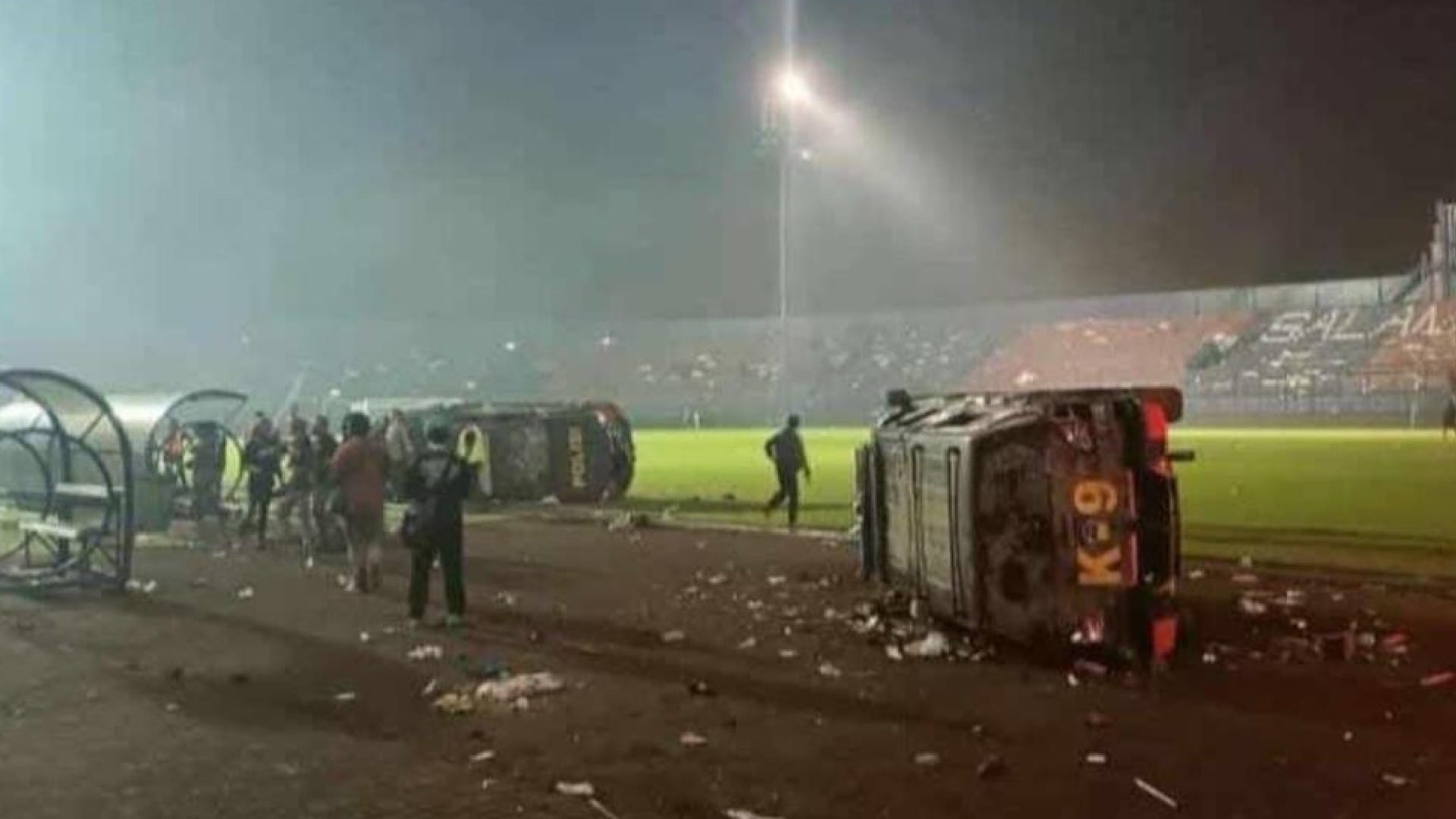 Indonesia Football Riot violence people dead crying Arema FC and Persebaya Surabaya match pictures