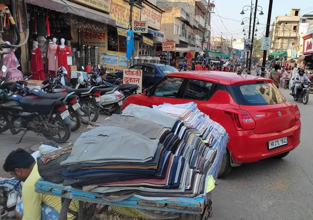 30 feet wide road remains only ten feet during the day due to encroachment
