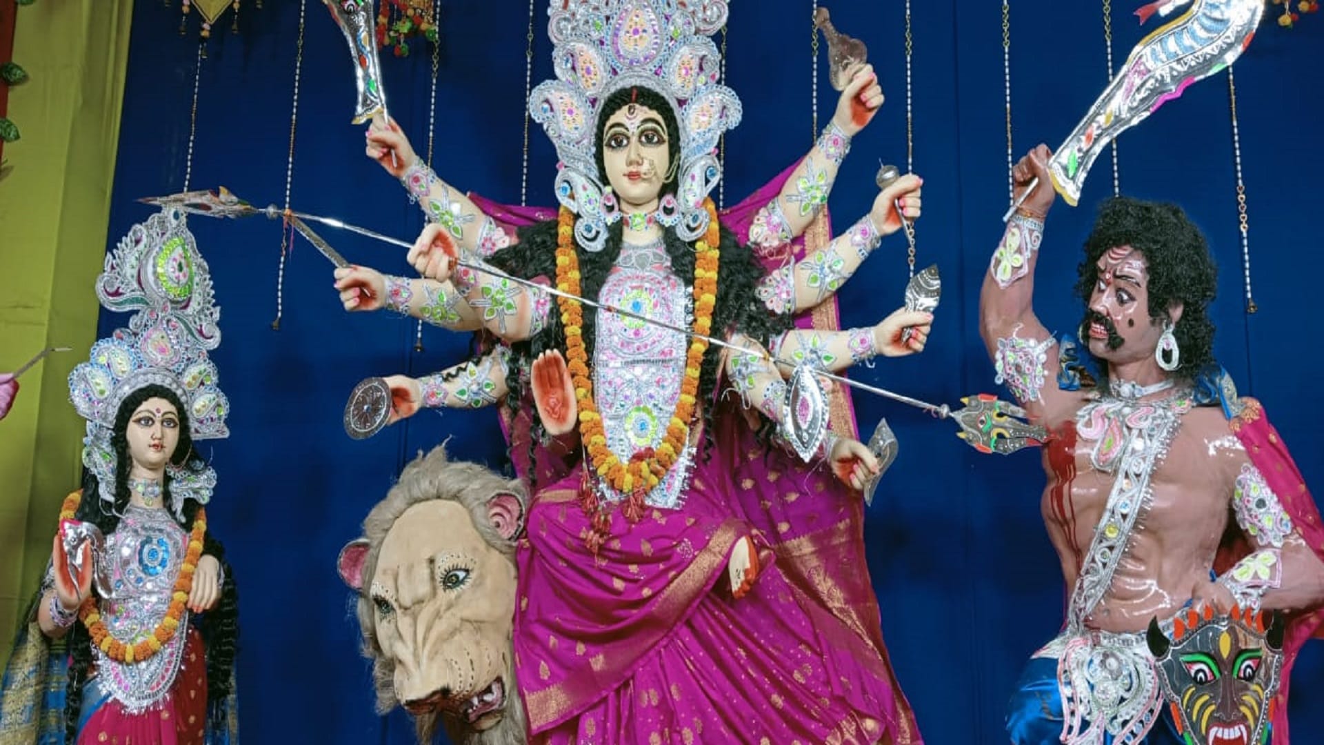 The statue of the mother emerged in the lamp people swayed in the garba