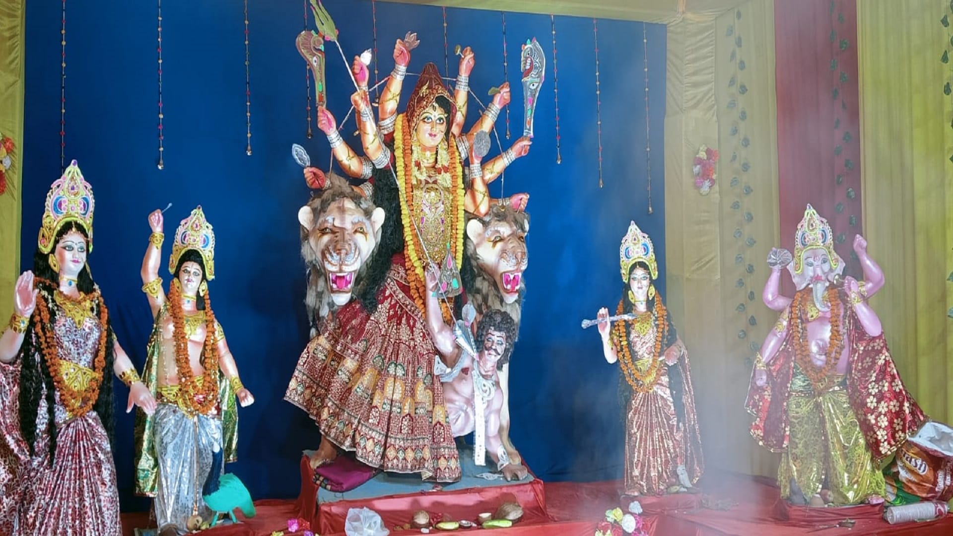 The statue of the mother emerged in the lamp people swayed in the garba
