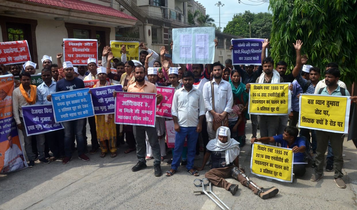 Demonstration of candidates outside the residence of Education Minister