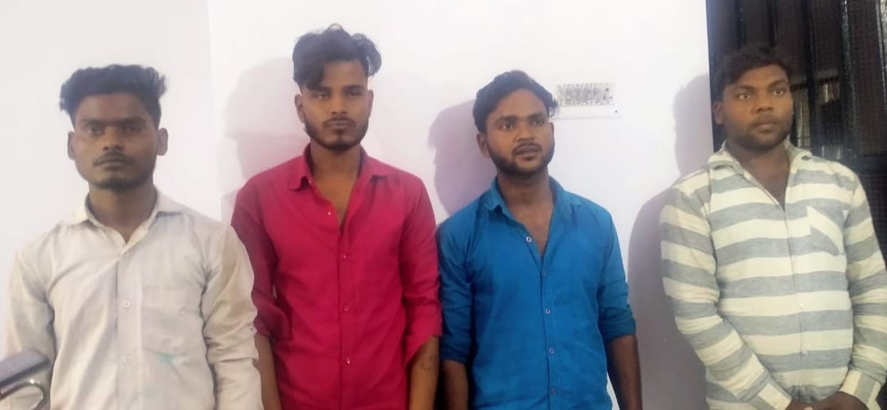 Four in robbery from businessman