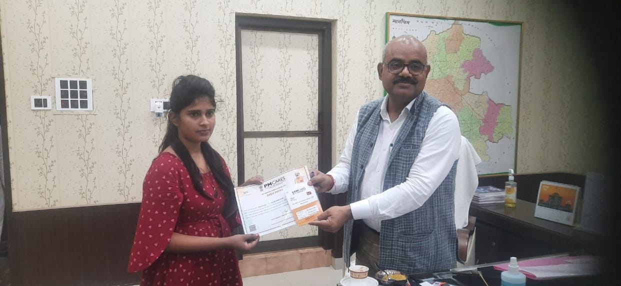 dm given pasbook to menu for pm cares fund