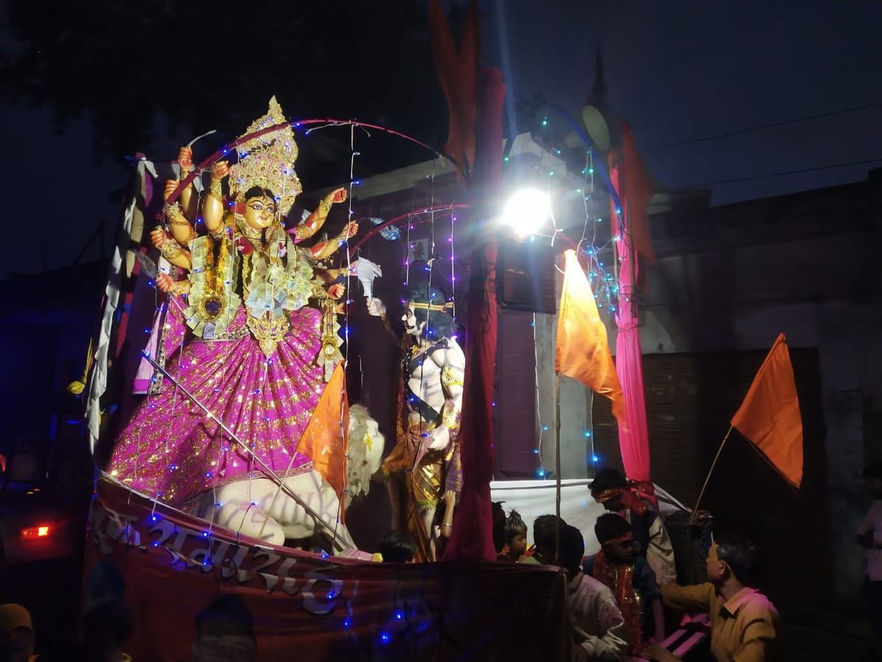 There was a cheer, the idols were immersed by blowing abir-gulal