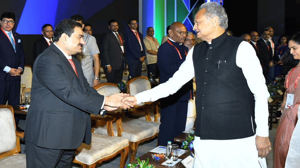 rahul gandhi always targets Gautam Adani and cm ashok Gehlot calls him bhai BJP says tight slap on top brass