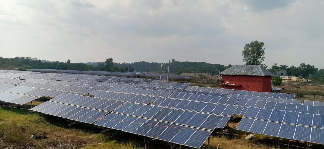 Engineer providing electricity to the board installed solar power plant