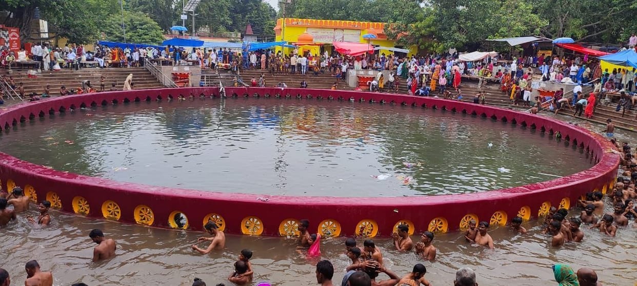 Devotees take a dip in Chakratirth