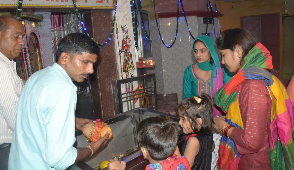 Offer pudding-puri to mother on Chaturdashi