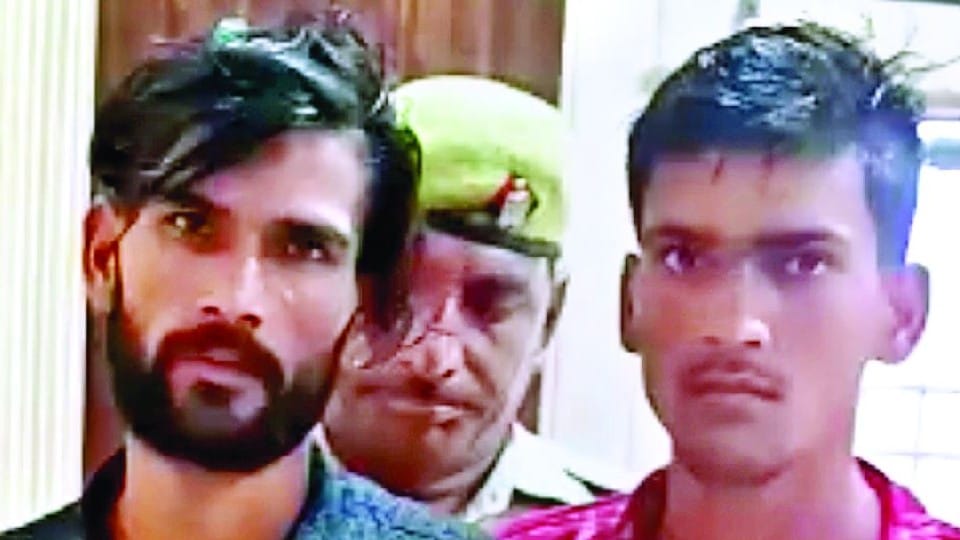 Two accused arrested for robbing as officers of crime branch in etah