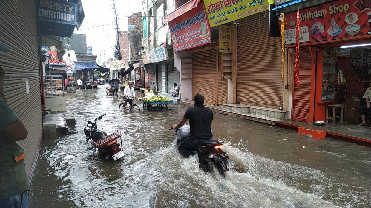 Roads became inundated due to rain, two houses also collapsed