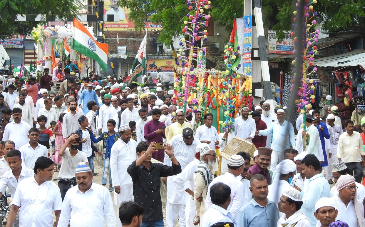 national and religious flags waved in waravafat procession