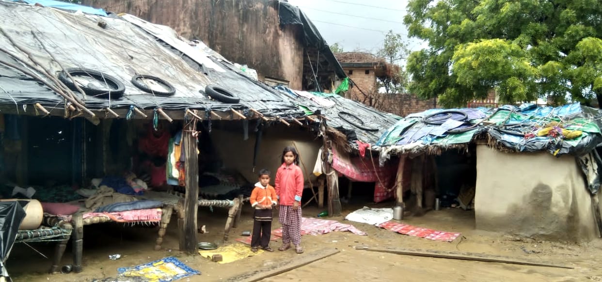 Poor family living by putting polythene
