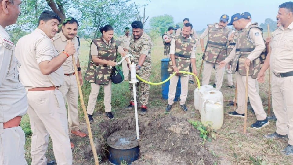 Hand pump spewing liquor in the villages of Guna district