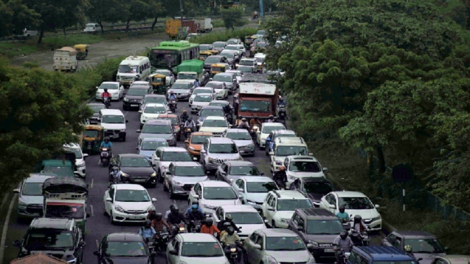 Due to potholes on the roads in Delhi people stuck on long jam