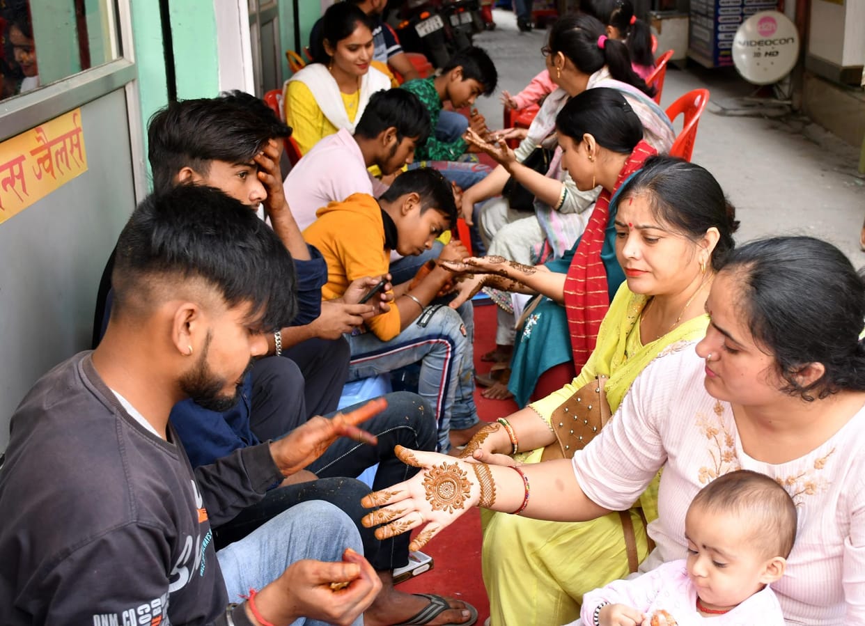 Women excited about Karva Chauth, got mehndi done by paying double