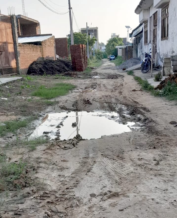 Roads are unpaved, no drainage system