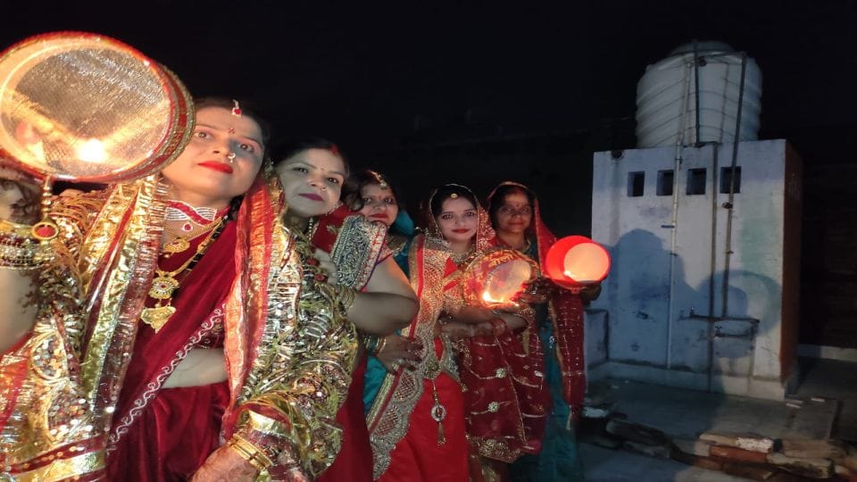 Karwa Chauth women seeing the moon and wish for husband long life in etah kasganj